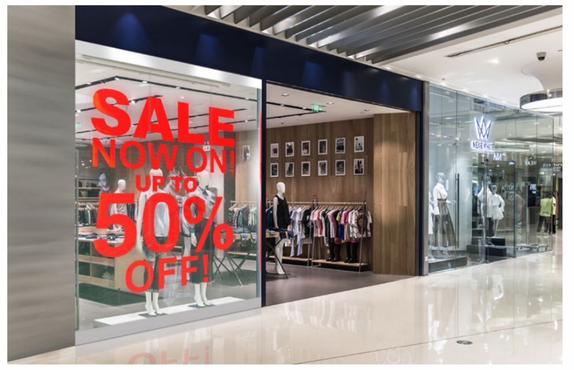 Transparent promotional display across a retail window